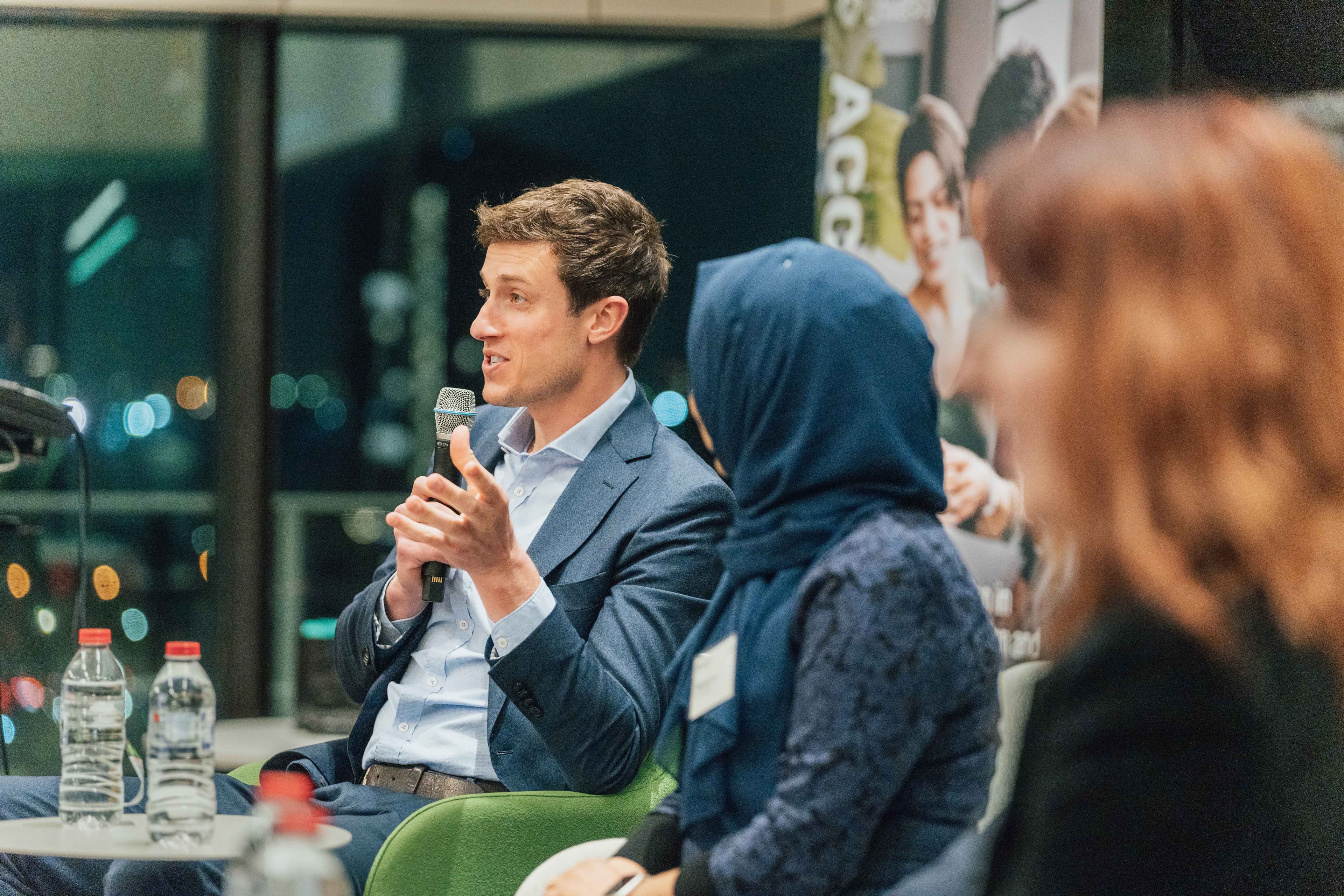 Chris Bush presenting AI strategy at a business conference